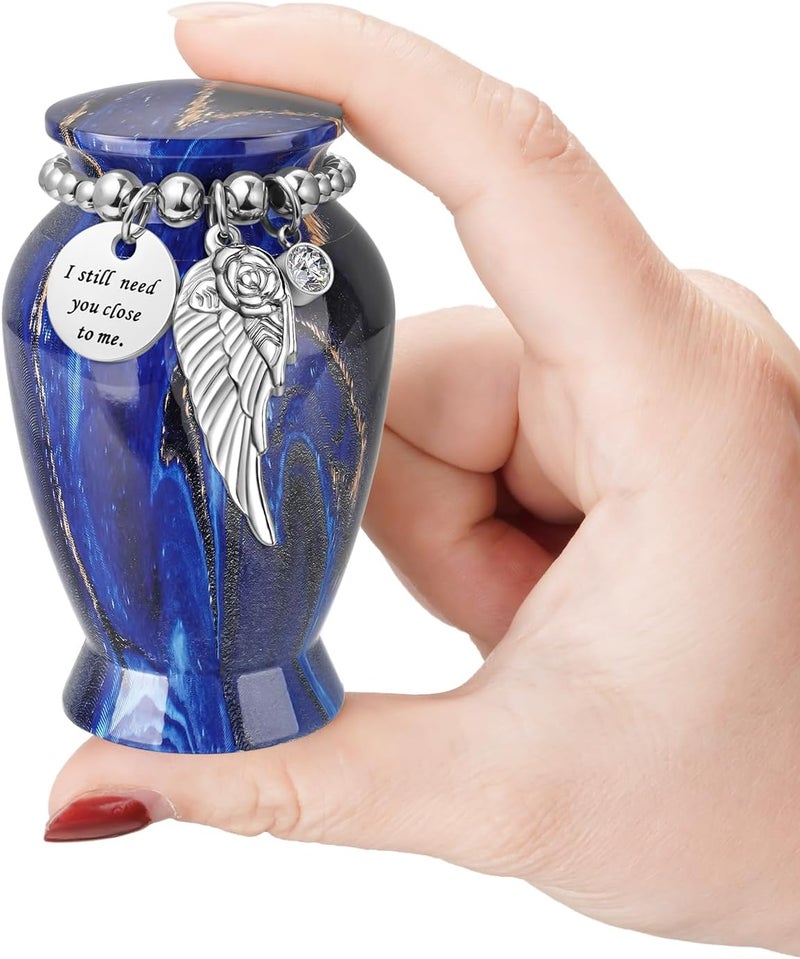 XIUDA Memorials Small Urns for Human Ashes Keepsake Aluminum Mini Urns for Ashes with Angel Wing Charm Decorative Burial Urn Funeral Cremation Urns for Women and Men (Deep Blue) - Image 1